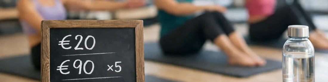 Tableau ardoise affichant les tarifs d'un cours de Pilates à 20 euros la séance