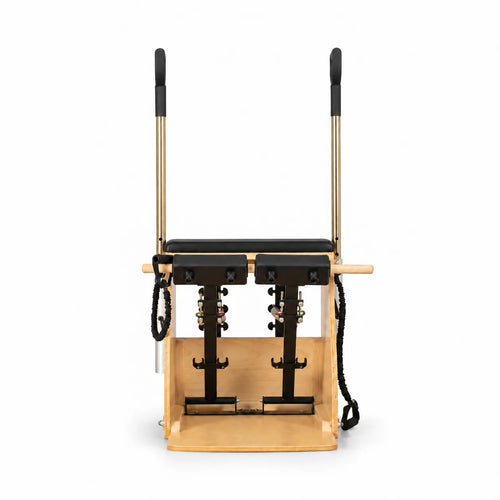 Chaise de Pilates Classique vue de face - structure en bois naturel clair avec ressorts et pédalier