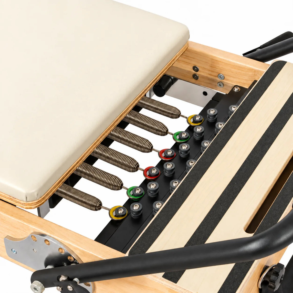 Système de ressorts et réglage de résistance du reformer Pilates studio en bois naturel - Pilates At Home