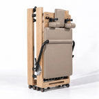 Machine reformer Pilates pliable en position repliée, cadre bois clair avec roulettes, vue de face - Pilates At Home