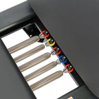 Cinq ressorts en acier inoxydable du Reformer Pilates Studio Pro avec connecteurs colorés rouge jaune bleu - Pilates At Home